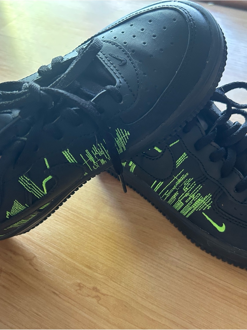 Nike Kids Black Sneakers with Neon Green Stitch Detail